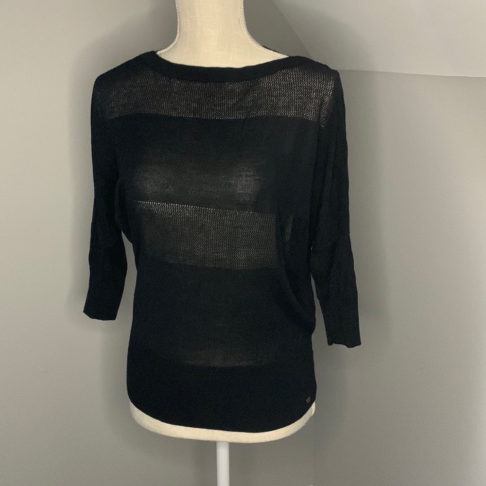 Woman top blouse, black color, used.